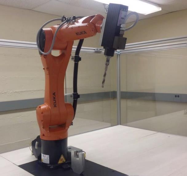 Fig. 3. KUKA robot with spindle installed. Fig. 4. End-effector for 3D printing. Fig. 5.