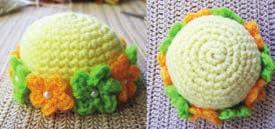 Sew flowers on hat with white bead in the middle as in pictures. Green Hat Make one Orange flower and one small Yellow flower.