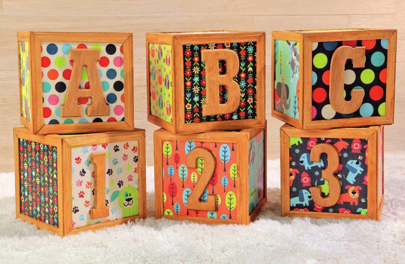 SUPPLIES: Foam Blocks Scrapbook Paper, Wrapping Paper or Fabric Wooden Letters Dollhouse Flooring (Broken Into 3-Plank Sheets) Scissors Découpage