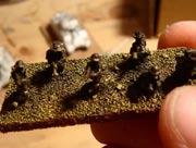With infantry it is important to get a nice flat colour instead of a quick drybrush so you will have to change gears when you start with the chaps on foot.
