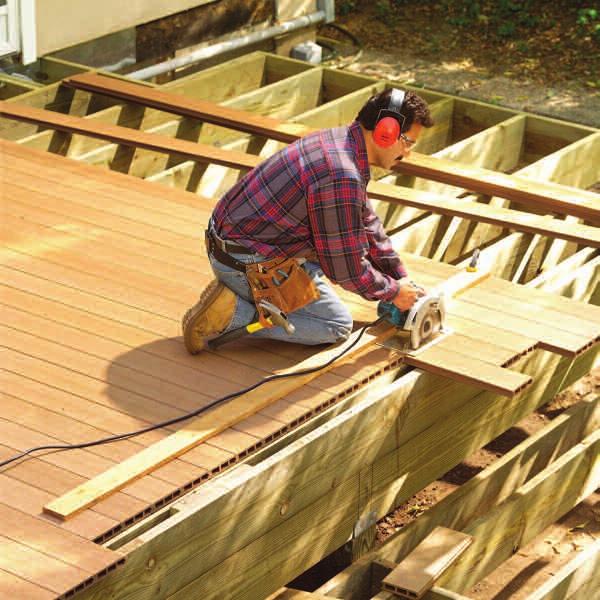 ) and nail the first board into place. Unscrew the blocks and slide the decking back. Slide the 10 tongues and grooves together and line up the ends.