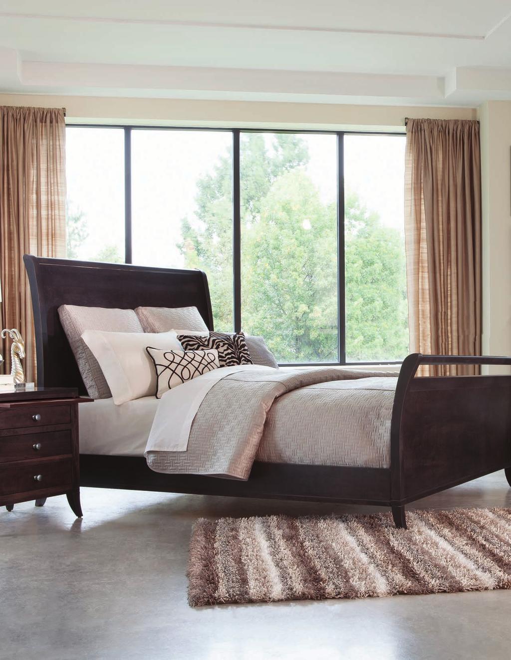 Picured: Adrienne Queen Sleigh Bed wih High Fooboard, iem 10113 is shown here.