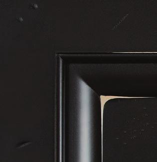 The remaining glaze material hangs in profiles of doors, drawer fronts and other select components