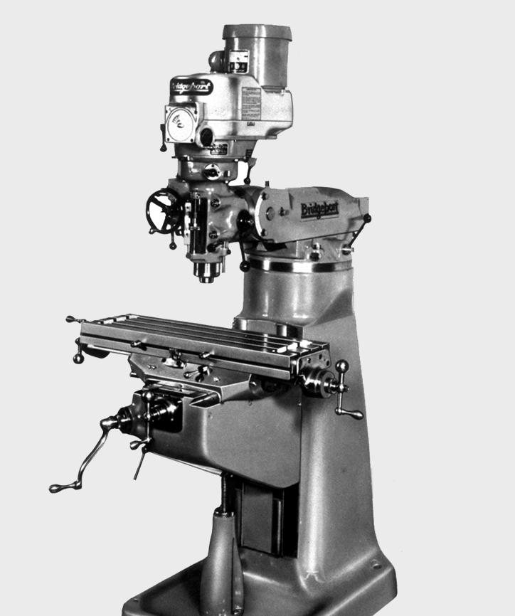 6 Lesson One Fig. 1-2. Ram-and-turret type knee-and-column milling machine Spindle head Quill Table Ram Column Turret 1.08 Fixed and adjustable trip dogs on the machine shut off the feed.