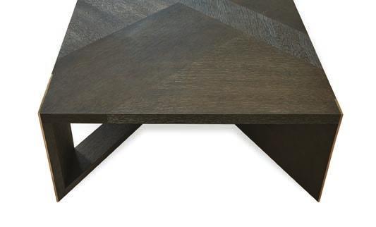 table with wide metal plate leg detail.
