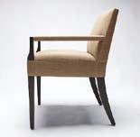Tight back with loose seat and lumbar cushion. Optional reeded back inlay.