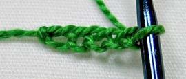 With your lightest color green, Chain (ch) 5 Here's where the paper clip comes in. I opened it and bent one end into a hook.