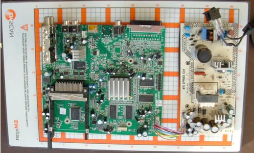 Fig. 1: Satellite Receiver Board positioned on patented scanner.