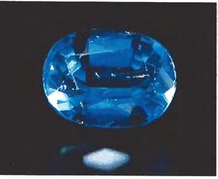 Figure 15. A 6.73-ct assembled stone with a synthetic green spinel crown and a Verneuil synthetic blue sapphire pavilion. (2050 C).