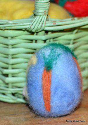 Styrofoam egg. Add more roving as needed to completely cover the surface of the egg.