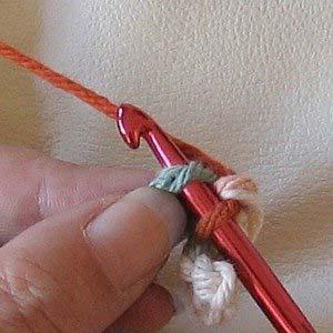 What Part of the Chain Loop Do You Pick Up? page number 7 If you look carefully at a chain stitch you'll see that there are 3 strings.