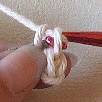 Hook your yarn again (this can either be done