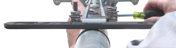 Tighten the insulator clamps after each of the insulators