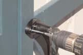 22. Inserting door handle Insert the door handle into the pre-drilled opening.