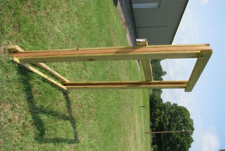 Upper left- View from one gate to the other inside the trap. Upper right-trap set with both gates set to catch.