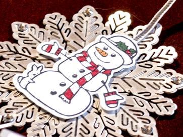 Cut 3 2 Whisper White and 1 Silver Glimmer snowflakes using the large snowflake die from Tags & Stockings Framelits.