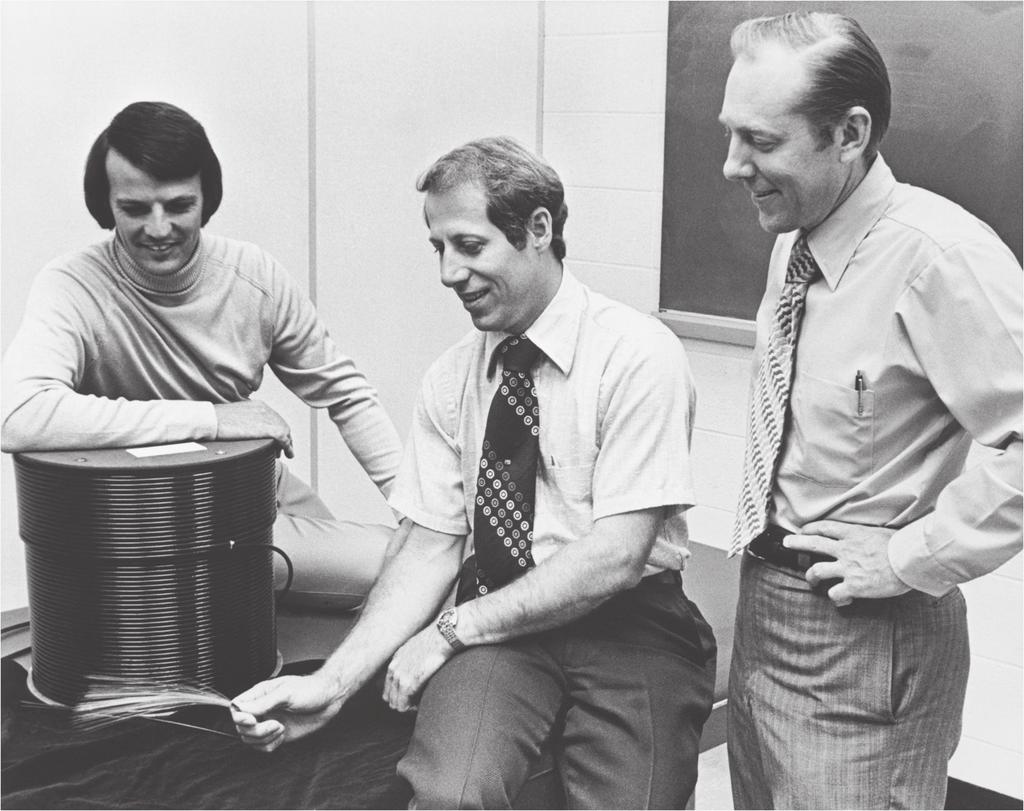 Peter Schultz, Donald Keck, and Bob Maurer (left to right) at Corning were the first to produce low-loss optical fibers in the 1970s by using the outside vapor deposition method for the