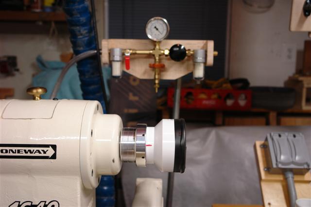 Here's a pic of the vacuum chuck: After putting it all together, I tried the system with a piece of 3/4" Maple board held to a 3" vacuum chuck and the system was drawing 25.5 inches of mercury.