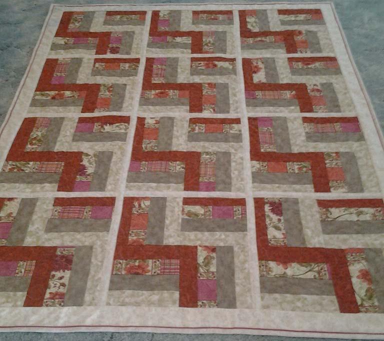 Jill M. writes I made this quilt for our daughter in laws 50th birthday, using fabrics purchased from your store.