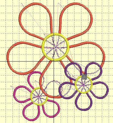 Right click and drag to create a second flower. 32. Change colors of each flower. 33. Ungroup each flower to add fabric graphic to each petal in applique and fabric choice. Centers of Flower: 34.