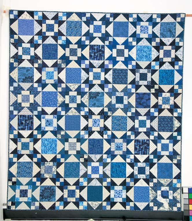 Designed by Kathie Holland Machine Quilted by Lorre Fleming Finished Quilt Size 66H x 75H Number of Blocks and Finished Size 16 Star Blocks 12 x 12 Skill Level ff Quiltin the Blues