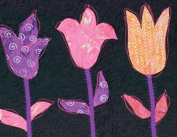 Skill Level ff Tulip Parade Joyce s use of bright batiks against a black background gives this quilt a