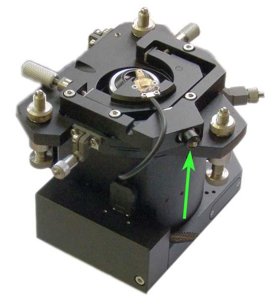 Chapter 10. Preparing for AFM Measurements Fig. 10-15. AFM probe holder installed. Arrow indicates handle of the clamp (here the measuring head is shown without the side illumination module) 5.