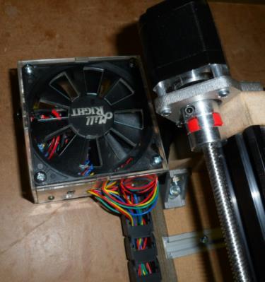 Plug up your power supply to see if wires are being hit by the fan blade.