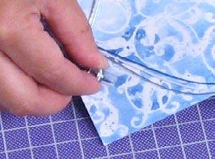 Mount the batik element on a white 5 " square greeting card or use as focal point on a scrapbook page.