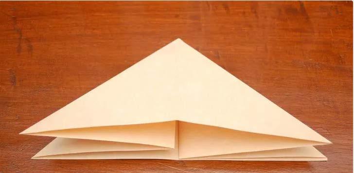 Origami Box Folding Instructions 1. Fold a sheet of square paper in half vertically and then horizontally.