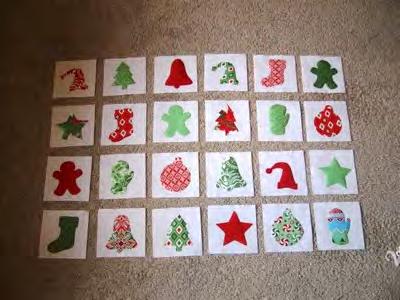 Press the appliqué to fuse it to the charm square. Repeat this process for all 24 Christmas image appliqué's. Now you can move over to your sewing machine.