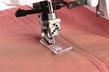 200-802-006 ABCDEFGHIJKLM PINTUCKING FOOT (K) 200-802-202 ABCDEFGHIJKLM TOPSTITCH GUIDE The topstitch covered