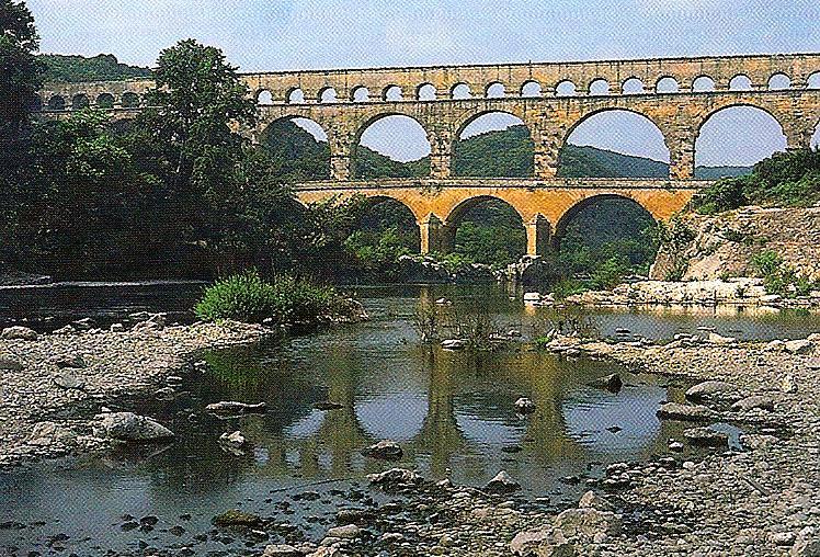 Title: Pont du Gard Culture: Roman Medium: limestone and concrete Description: aqueduct Round arch- semicircular arch made with wedge-shaped stones fitted together with joints at right angles; it