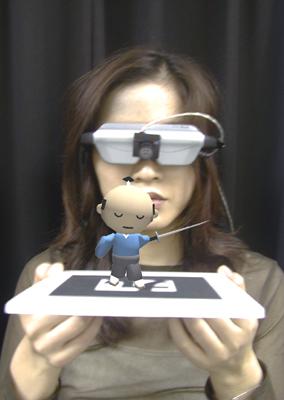 Introduction Tangible Augmented Reality [Kato 2001] Each virtual object registered to