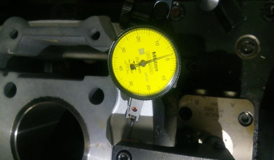 Least count value for dial indicator is 0.01 mm that is 10 micron.