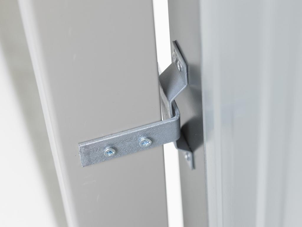 Step 2: Once doors are hung, position the Locking Stays so they slide into the Locking Brackets easily.
