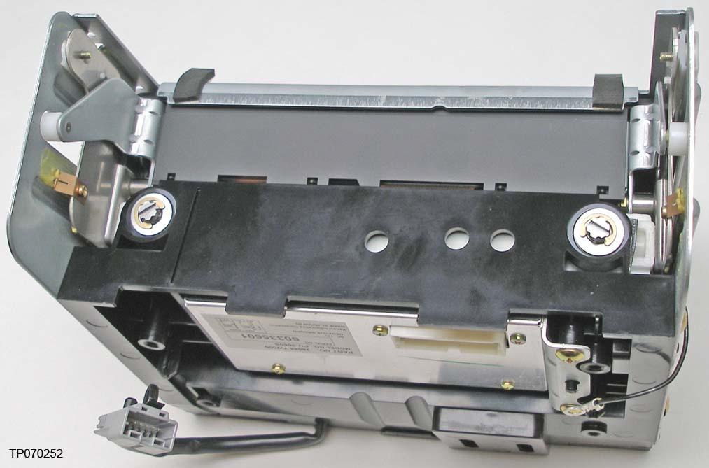 11. Raise the display unit in the motor assy.