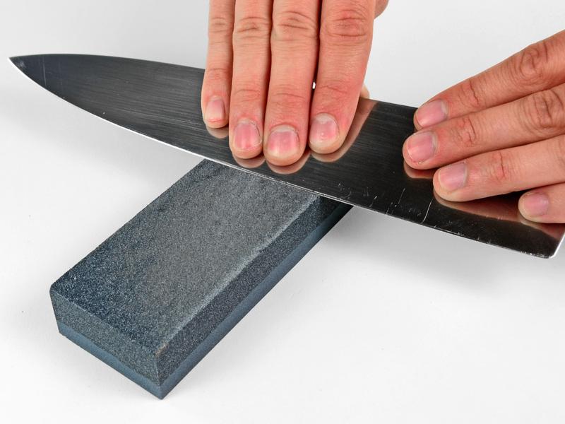 Be sure to apply pressure to the portion of the blade in contact with the flat plane of the stone.
