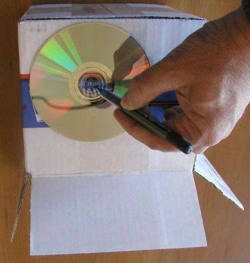 like AOL. 2. A cardboard box. An 8 inch cube works fine, but any size that can hold a CD or DVD disk will do. 3. Two single edged razor blades. These can be found in paint or hardware stores. 4.