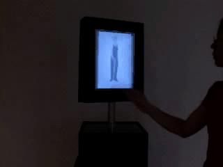 Paintbrush with embedded video camera, lights and touch