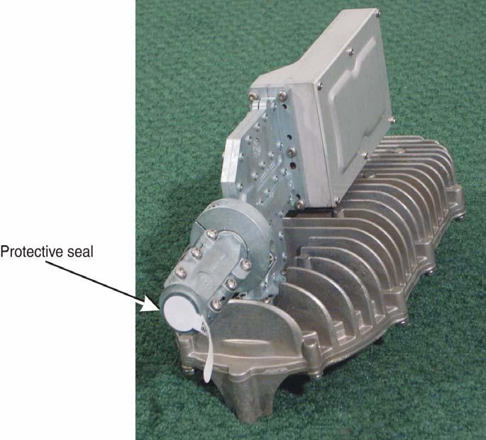 Installing the feed horn To attach the feed horn to the radio assembly: 1. Remove and discard the protective seal from the polarizer on the radio assembly (shown in Figure 21).