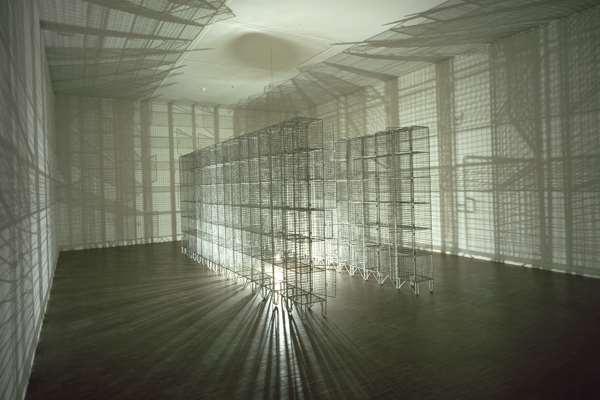 7 198 x 185 x 490 cm Mona Hatoum, Light Sentence 1992 wire mesh lockers, slow moving motorised light bulb.