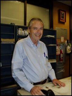 Staff Spotlight: Tom DeCair Whenever you run into someone who never uses the library, you might tell them what Library Page, Tom De- Cair, would say to someone like that: the library contains the