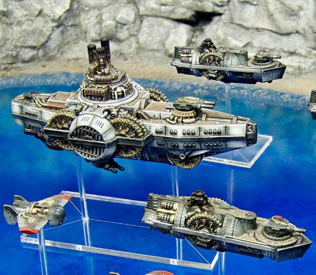 be assembled. Here you can see three of its key flying machines of war in formation: the Tunguska Class Large Skyship, Saransk Class Medium Skyship, and Suyetka Class Small Skyships.