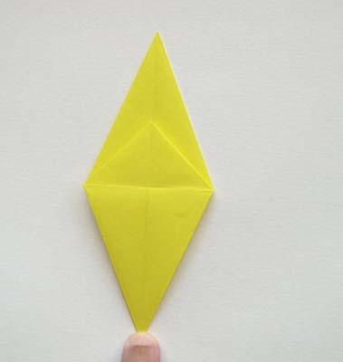 Start with a single piece of brightly colored origami paper.