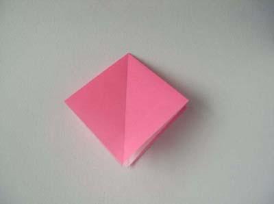 square folded piece of paper.