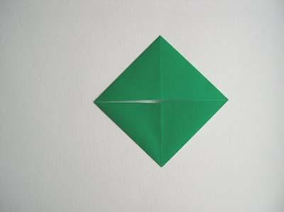 photo. Now fold each of the four corners into the center point, to make another square.