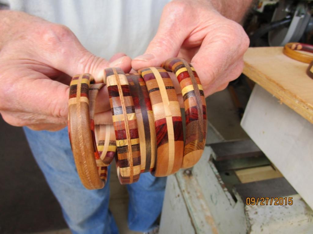 Reverse the bracelet blank and re-mount it using the tail stock to hold it in place. Center the blank very carefully in the jam chuck and then reuse the tape to re-tape it in place.