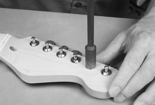 Assemble your guitar During assembly, use a padded surface to protect the finish from scratches and dents.