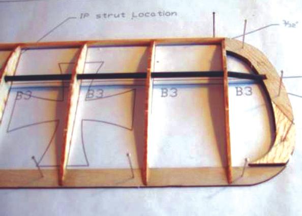 Use bass or spruce to form the front undercarriage mounts on the ﬁrewall as shown on the plan. Add the horizontal stabilizer supports F11 between F10 and the end of the fuselage.